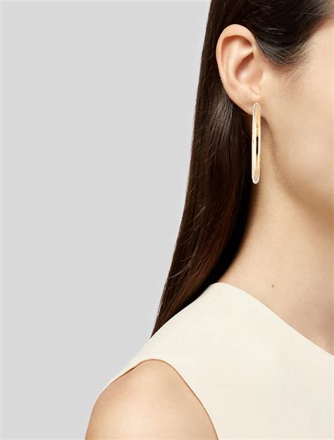 two tone fendi hoop earrings